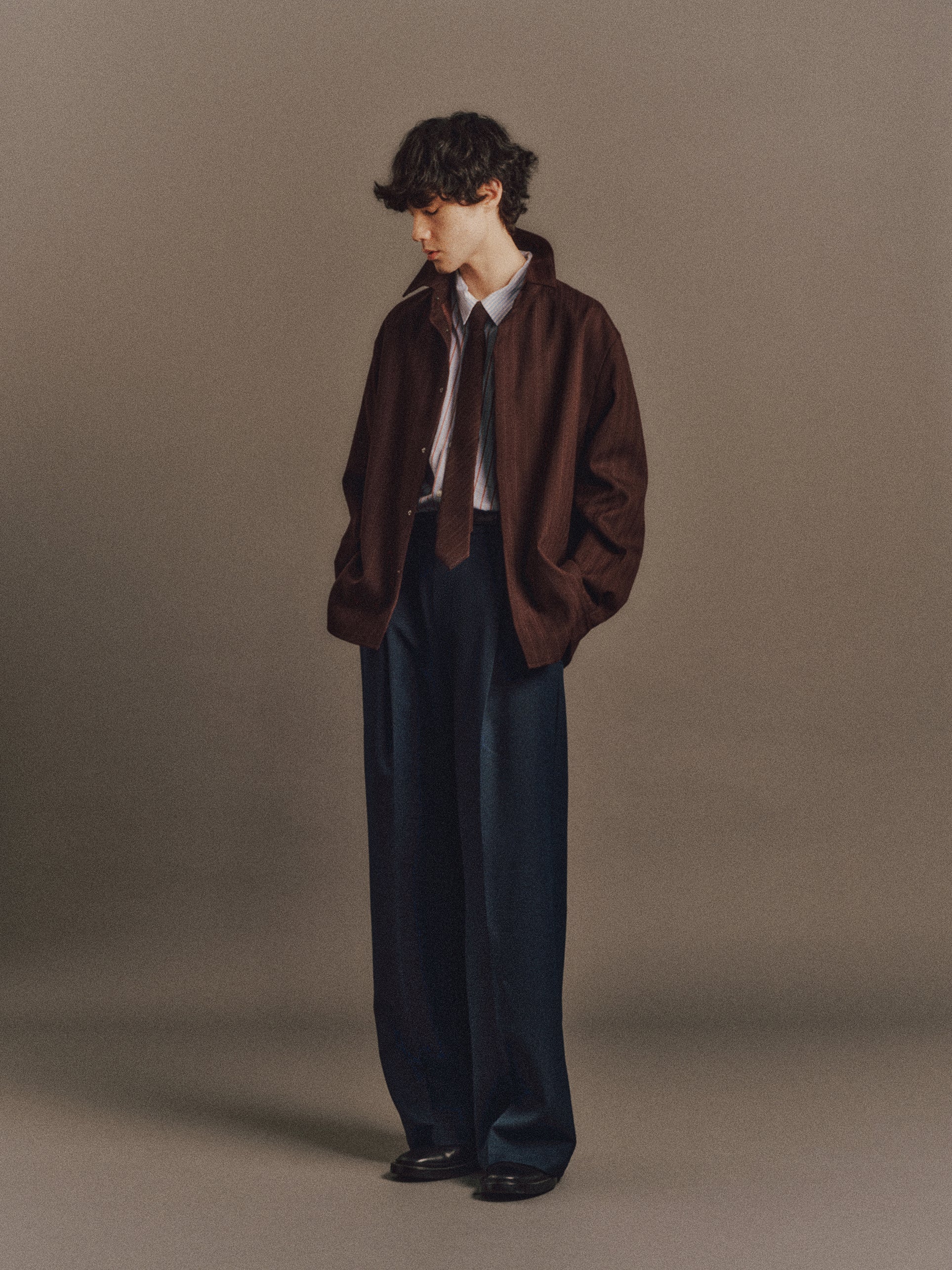 Émile wears Gracie Shirt In Blue Sripe, Albert Jacket In Wine Red Stripe, Luka Pant In Dark Navy, Charlotte Tie In Wine Red Stripe