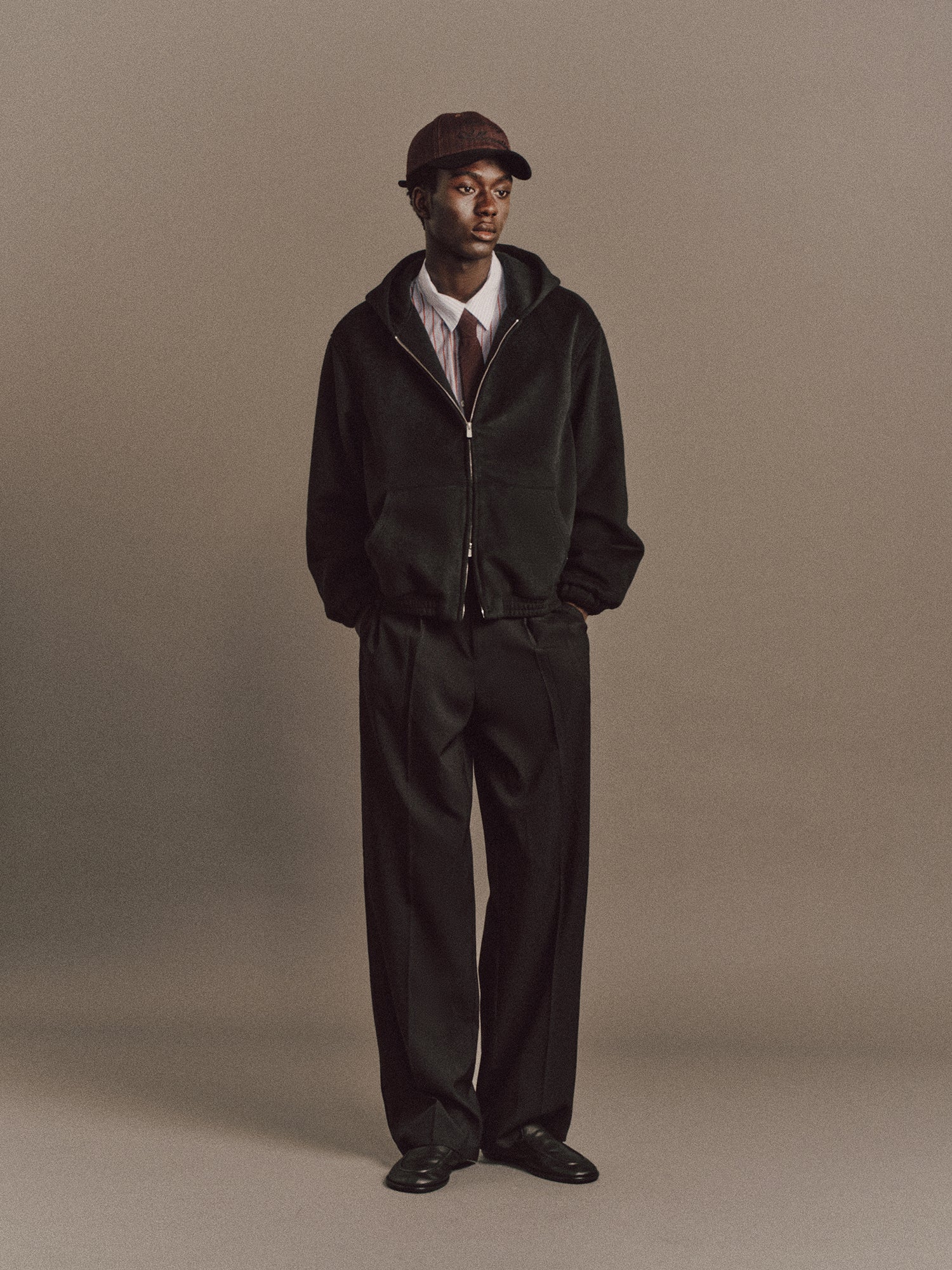 Muhamed wears Gracie Shirt In Blue Sripe, Carter Pant In Black, Charlotte Tie In Wine Red Stripe